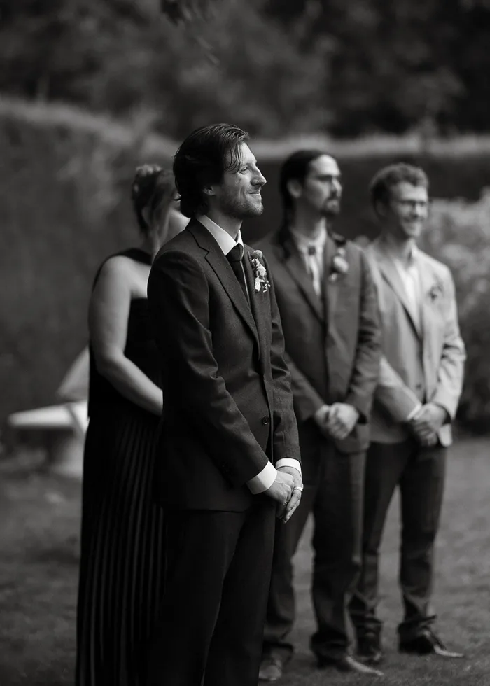 Groom waiting at altar, B&W