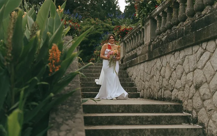 Bride descending stone stairs
