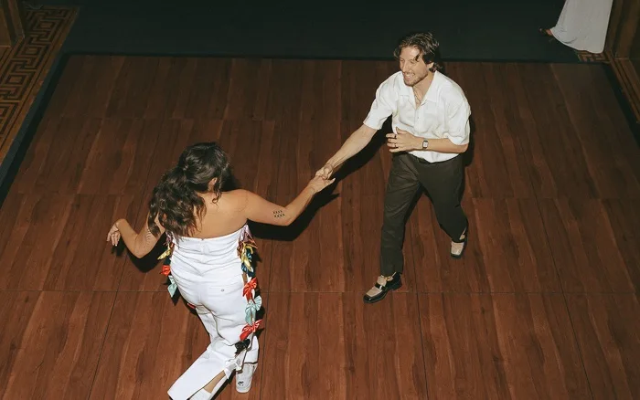 Couple leading the dance